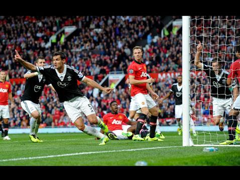 Dejan Lovren celebrates Saints' equaliser at Old Trafford - his claim to the goal was later taken by Adam Lallana
